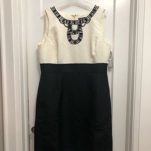 Gorgeous brand new Tahari Size 16US dress with beautiful beading! Very elegant.